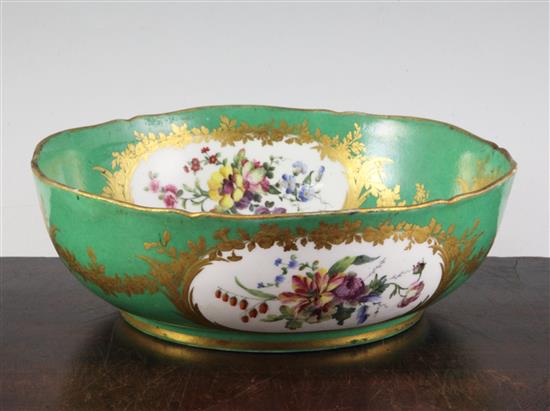 A pair of Sevres porcelain green ground bowls, c.1773, diameter incl. mounts 24cm (9.5in.), some decoration possibly later